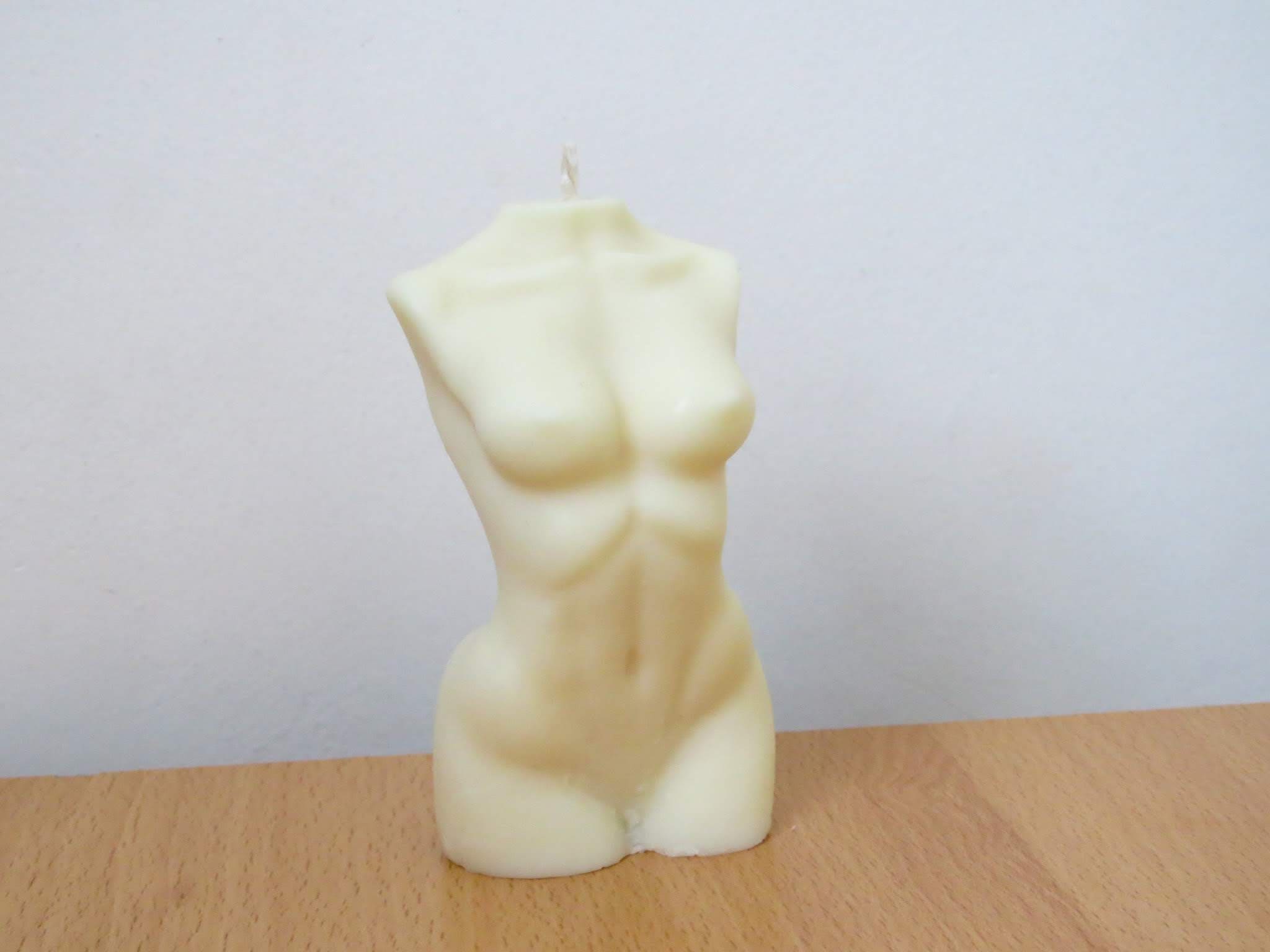 Vela decorativa con forma de cuerpo